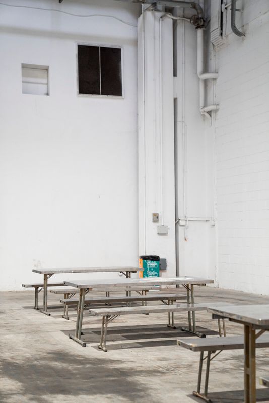 <div class='imageHoverDetail'>
             <p class='imageHoverTitle twoLineBreak'>Pavelló per a persones sense llar. Sala amb taules i bancs per seure-hi</p>
             <p class='imageHoverAutor oneLineBreak'>Autor: Clara Soler Chopo</p>
             <button class='imageHoverBtn'>Mostra els detalls de la imatge <span class='sr-only'>Pavelló per a persones sense llar. Sala amb taules i bancs per seure-hi</span></button>
             </div>